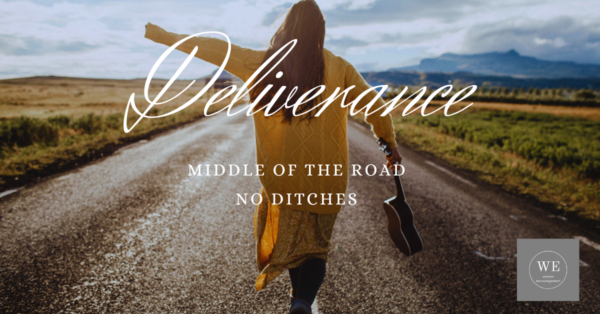 Woman walking in the middle of the road